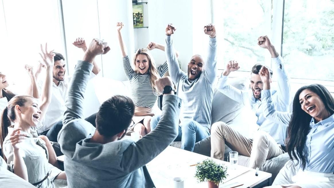 Student reviewing automation workflow on computer screen with notes and documentation