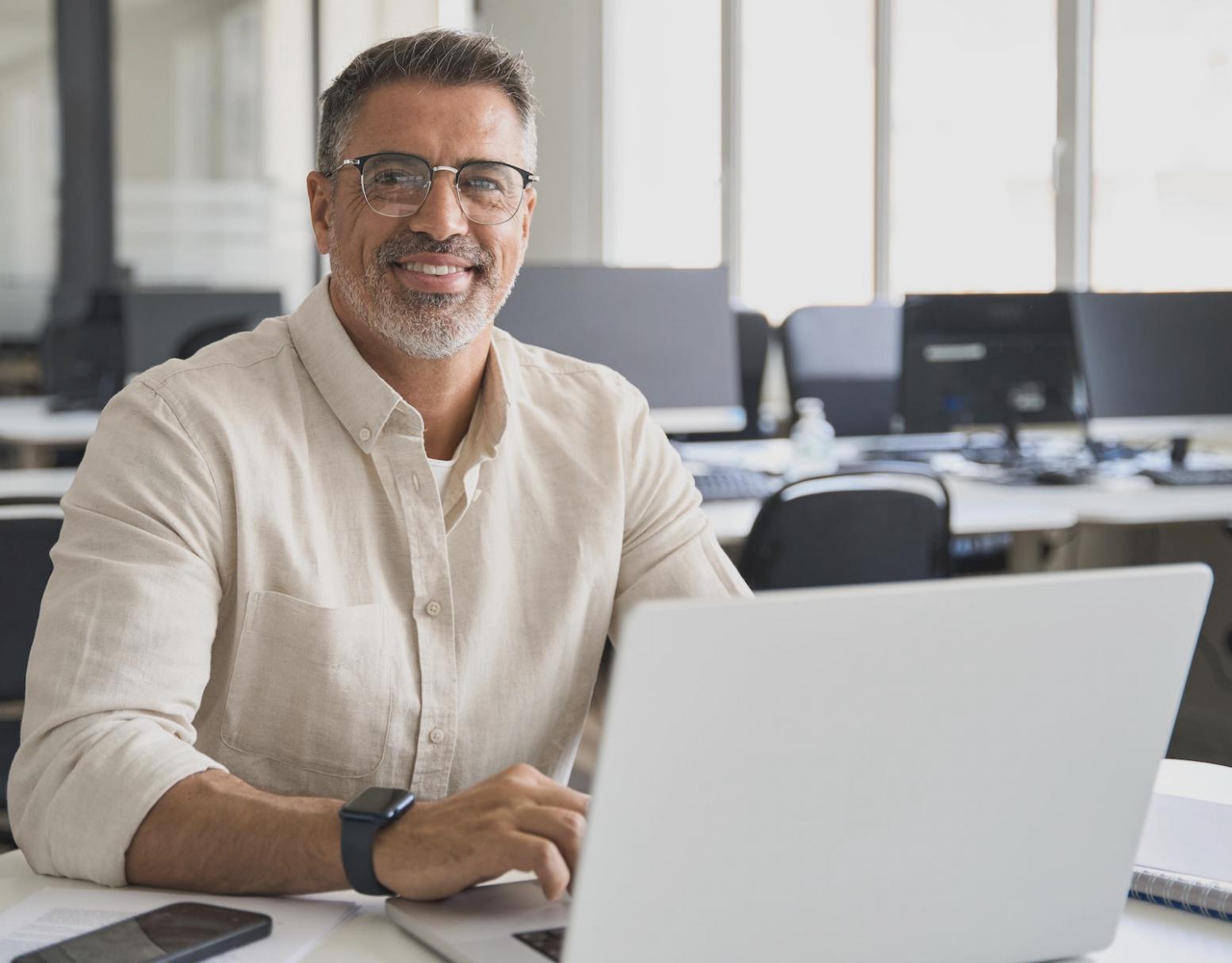 Professional workspace showing collaborative business planning and automation strategy development in a modern office environment